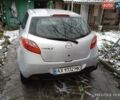 Серый Мазда 2, объемом двигателя 1.4 л и пробегом 150 тыс. км за 6000 $, фото 1 на Automoto.ua