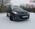 Серый Мазда 2, объемом двигателя 1.5 л и пробегом 178 тыс. км за 6050 $, фото 1 на Automoto.ua