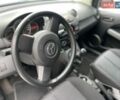 Серый Мазда 2, объемом двигателя 1.3 л и пробегом 194 тыс. км за 5950 $, фото 1 на Automoto.ua