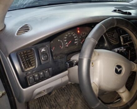 Сірий Мазда 2, об'ємом двигуна 2 л та пробігом 250 тис. км за 2400 $, фото 1 на Automoto.ua