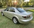 Серый Мазда 2, объемом двигателя 2 л и пробегом 249 тыс. км за 4200 $, фото 5 на Automoto.ua