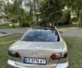Серый Мазда 2, объемом двигателя 2 л и пробегом 249 тыс. км за 4200 $, фото 4 на Automoto.ua