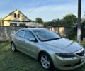 Серый Мазда 2, объемом двигателя 2 л и пробегом 249 тыс. км за 4200 $, фото 2 на Automoto.ua