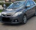 Серый Мазда 2, объемом двигателя 2 л и пробегом 236 тыс. км за 8224 $, фото 1 на Automoto.ua