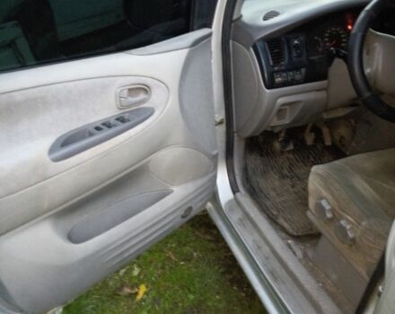 Серый Мазда 2, объемом двигателя 2 л и пробегом 250 тыс. км за 2400 $, фото 1 на Automoto.ua