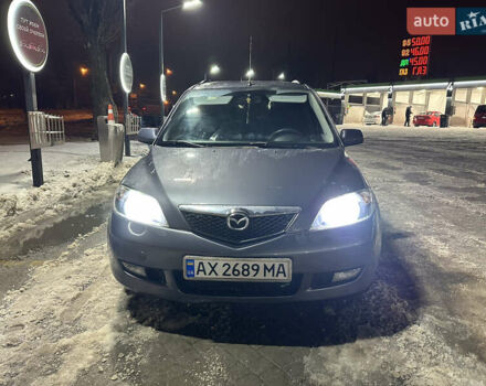 Серый Мазда 2, объемом двигателя 1.4 л и пробегом 260 тыс. км за 3900 $, фото 1 на Automoto.ua