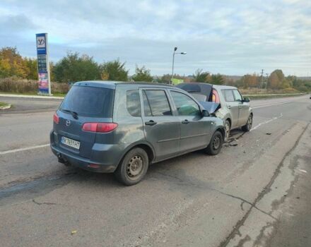 Серый Мазда 2, объемом двигателя 1.2 л и пробегом 180 тыс. км за 1100 $, фото 1 на Automoto.ua