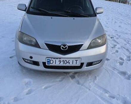 Серый Мазда 2, объемом двигателя 1.4 л и пробегом 324 тыс. км за 3500 $, фото 1 на Automoto.ua