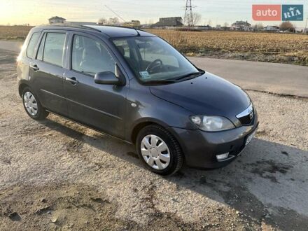 Серый Мазда 2, объемом двигателя 1.39 л и пробегом 120 тыс. км за 2999 $, фото 1 на Automoto.ua