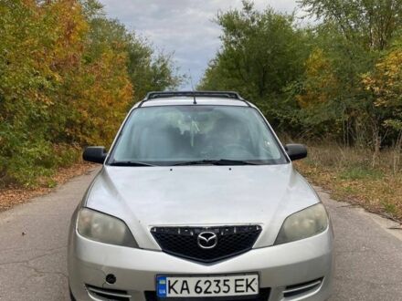 Серый Мазда 2, объемом двигателя 1.4 л и пробегом 248 тыс. км за 3499 $, фото 1 на Automoto.ua