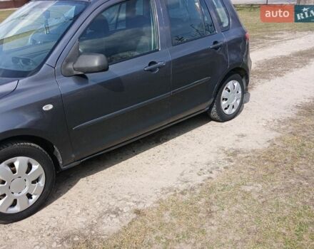 Сірий Мазда 2, об'ємом двигуна 1.39 л та пробігом 150 тис. км за 3300 $, фото 1 на Automoto.ua