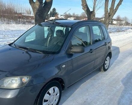 Сірий Мазда 2, об'ємом двигуна 1.39 л та пробігом 150 тис. км за 3400 $, фото 1 на Automoto.ua