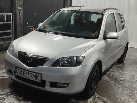 Серый Мазда 2, объемом двигателя 1.6 л и пробегом 158 тыс. км за 4000 $, фото 1 на Automoto.ua