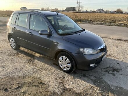 Сірий Мазда 2, об'ємом двигуна 1.4 л та пробігом 120 тис. км за 2999 $, фото 1 на Automoto.ua