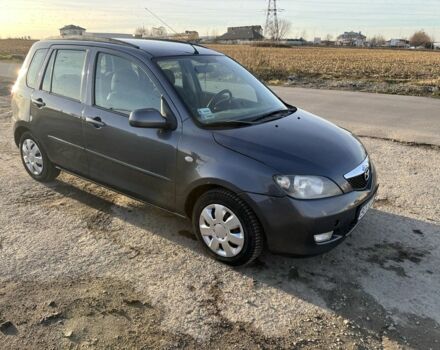 Серый Мазда 2, объемом двигателя 1.4 л и пробегом 120 тыс. км за 2999 $, фото 1 на Automoto.ua