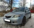 Серый Мазда 2, объемом двигателя 1.4 л и пробегом 147 тыс. км за 5700 $, фото 1 на Automoto.ua