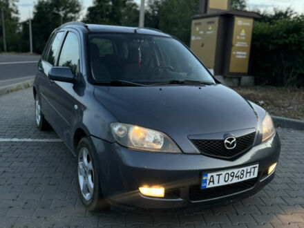 Сірий Мазда 2, об'ємом двигуна 1.39 л та пробігом 259 тис. км за 3750 $, фото 1 на Automoto.ua