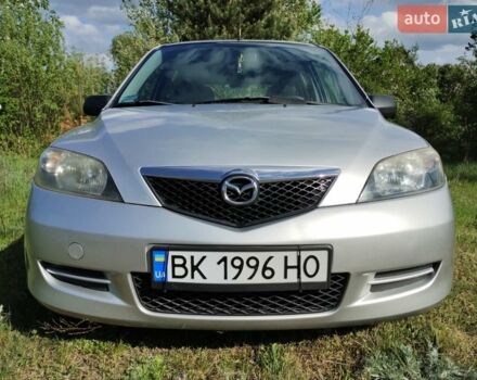 Серый Мазда 2, объемом двигателя 1.4 л и пробегом 290 тыс. км за 3300 $, фото 1 на Automoto.ua