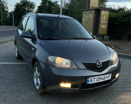Серый Мазда 2, объемом двигателя 1.39 л и пробегом 220 тыс. км за 3750 $, фото 1 на Automoto.ua
