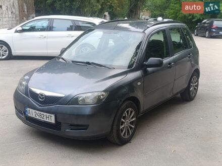 Серый Мазда 2, объемом двигателя 1.4 л и пробегом 329 тыс. км за 2500 $, фото 1 на Automoto.ua