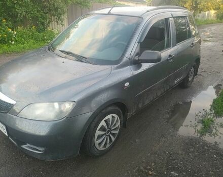 Серый Мазда 2, объемом двигателя 1.4 л и пробегом 12 тыс. км за 2500 $, фото 1 на Automoto.ua