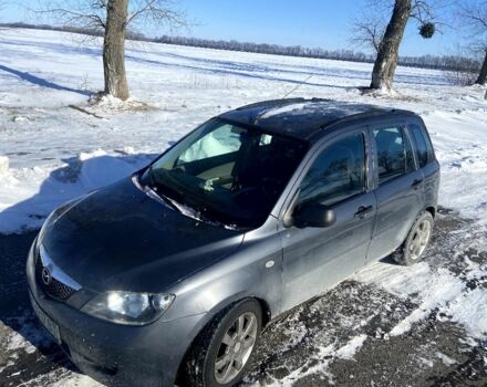 Сірий Мазда 2, об'ємом двигуна 1.4 л та пробігом 253 тис. км за 3300 $, фото 1 на Automoto.ua