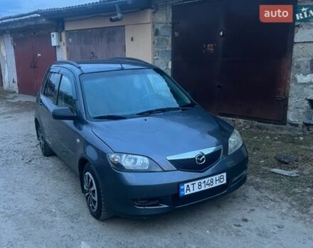 Серый Мазда 2, объемом двигателя 1.4 л и пробегом 202 тыс. км за 2300 $, фото 1 на Automoto.ua