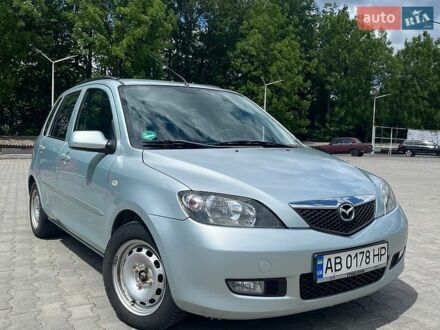 Серый Мазда 2, объемом двигателя 1.4 л и пробегом 262 тыс. км за 3400 $, фото 1 на Automoto.ua
