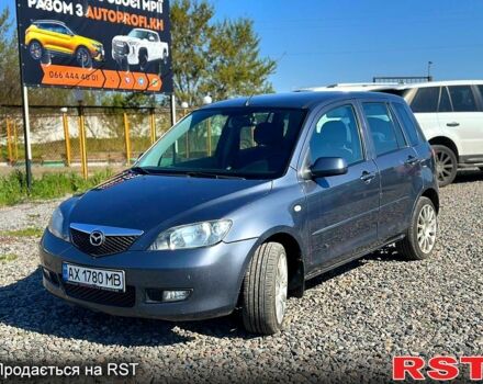 Серый Мазда 2, объемом двигателя 1.4 л и пробегом 253 тыс. км за 2450 $, фото 1 на Automoto.ua