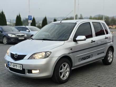 Сірий Мазда 2, об'ємом двигуна 1.4 л та пробігом 227 тис. км за 3950 $, фото 1 на Automoto.ua