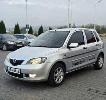 Сірий Мазда 2, об'ємом двигуна 1.4 л та пробігом 226 тис. км за 4350 $, фото 1 на Automoto.ua
