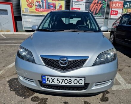 Серый Мазда 2, объемом двигателя 1.4 л и пробегом 166 тыс. км за 3900 $, фото 1 на Automoto.ua
