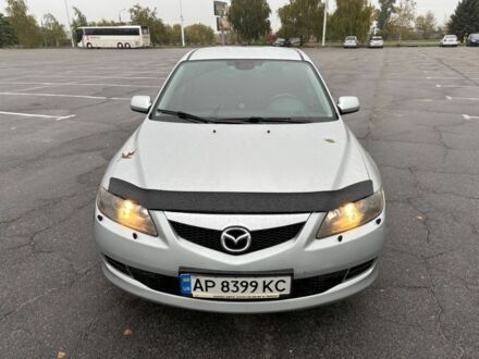 Сірий Мазда 2, об'ємом двигуна 2 л та пробігом 210 тис. км за 6194 $, фото 1 на Automoto.ua