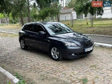Серый Мазда 2, объемом двигателя 1.6 л и пробегом 285 тыс. км за 4700 $, фото 1 на Automoto.ua