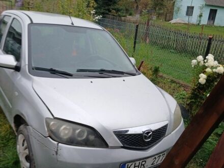 Сірий Мазда 2, об'ємом двигуна 1.4 л та пробігом 250 тис. км за 500 $, фото 1 на Automoto.ua