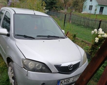 Сірий Мазда 2, об'ємом двигуна 1.4 л та пробігом 250 тис. км за 500 $, фото 1 на Automoto.ua