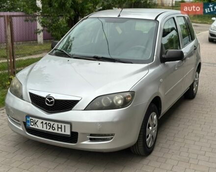 Серый Мазда 2, объемом двигателя 1.4 л и пробегом 238 тыс. км за 2400 $, фото 1 на Automoto.ua