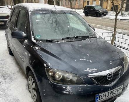 Сірий Мазда 2, об'ємом двигуна 1.4 л та пробігом 299 тис. км за 4150 $, фото 1 на Automoto.ua
