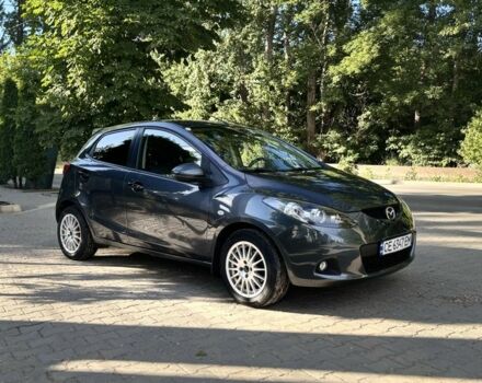 Серый Мазда 2, объемом двигателя 1.3 л и пробегом 245 тыс. км за 5000 $, фото 1 на Automoto.ua