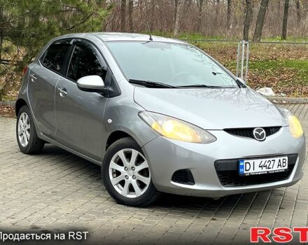 Серый Мазда 2, объемом двигателя 1.4 л и пробегом 249 тыс. км за 4700 $, фото 1 на Automoto.ua