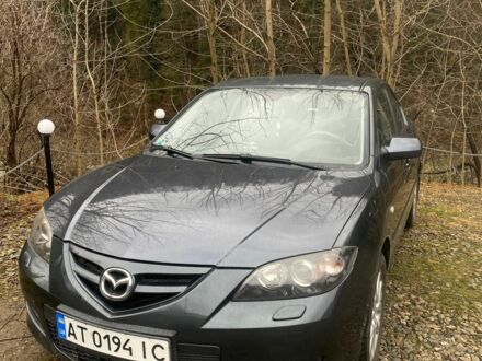 Серый Мазда 2, объемом двигателя 1.6 л и пробегом 141 тыс. км за 6100 $, фото 1 на Automoto.ua