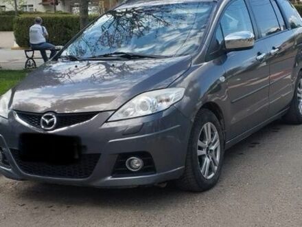 Сірий Мазда 2, об'ємом двигуна 2 л та пробігом 236 тис. км за 8224 $, фото 1 на Automoto.ua