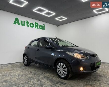 Серый Мазда 2, объемом двигателя 1.5 л и пробегом 159 тыс. км за 6499 $, фото 1 на Automoto.ua