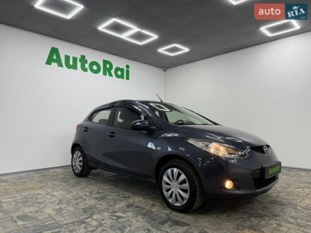 Серый Мазда 2, объемом двигателя 1.5 л и пробегом 159 тыс. км за 6499 $, фото 1 на Automoto.ua