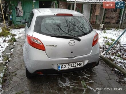 Серый Мазда 2, объемом двигателя 1.4 л и пробегом 150 тыс. км за 6000 $, фото 1 на Automoto.ua