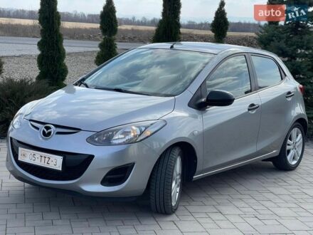 Серый Мазда 2, объемом двигателя 1.3 л и пробегом 194 тыс. км за 6850 $, фото 1 на Automoto.ua