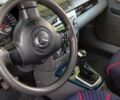 Синій Мазда 2, об'ємом двигуна 1.4 л та пробігом 255 тис. км за 3800 $, фото 6 на Automoto.ua