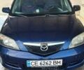 Синий Мазда 2, объемом двигателя 1.4 л и пробегом 255 тыс. км за 3800 $, фото 5 на Automoto.ua