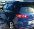 Синій Мазда 2, об'ємом двигуна 1.4 л та пробігом 255 тис. км за 3800 $, фото 1 на Automoto.ua