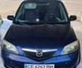 Синий Мазда 2, объемом двигателя 1.4 л и пробегом 255 тыс. км за 3800 $, фото 2 на Automoto.ua